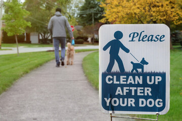  The warning sign: Clean up after your dog.