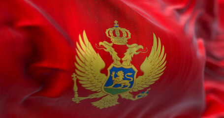 Close up view of the Montenegro national flag waving in the wind