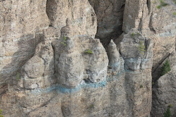 teal blue ore in the wall on canyon