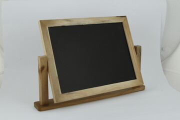 Small wood blackboard against a white background