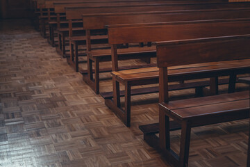 an empty pew in the church. absence of people in the Church.