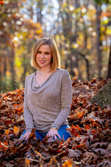 A Lovely Blonde Model Poses Outdoor While Enjoying The Fall Weather