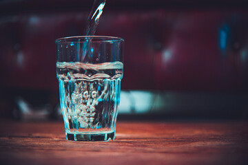 water pouring into glass