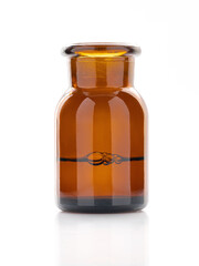 Amber glass bottles for cosmetics, natural medicine , essential oils or other liquids isolated on white background.