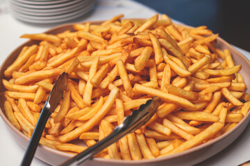 Catering table, beautifully decorated banquet table with variety of different food snacks, sandwiches, croissants and appetizers on party event or celebration, delicatessen setting, coffee break