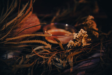 coffee obscured by Australian native flowers 