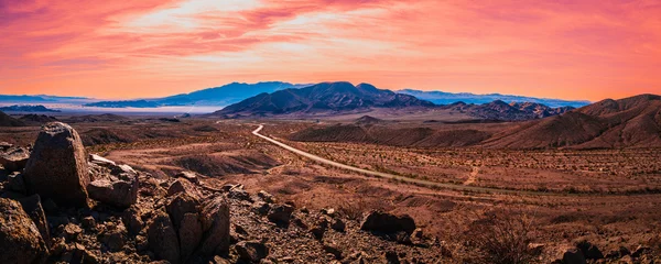 Fototapete Rund Tiefbraun Mojave Desert National Preserve, tranquil sunset hilltop landscape on California State 15 Mojave Freeway, California, USA   © Naya Na