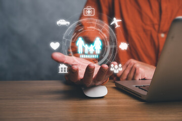 Insurance company client take out complete insurance concept, Person using laptop computer and hand holding VR screen Insurance icon background.