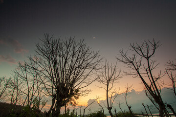 Fototapeta premium Lombok, tradisional boat near the Pink beach. People see beautiful and colourful sand near the pink beach Lombok Indonesia.