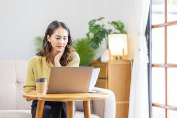 Recruitment Concept. Indian Asian Girl Browsing Work Opportunities Online, Using Job Search App or Website on Laptop, Copy Space