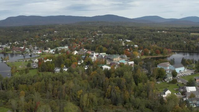 Drone shot of Rangeley Maine downtown with the Rangeley boat launch and Haley Pond in the background.