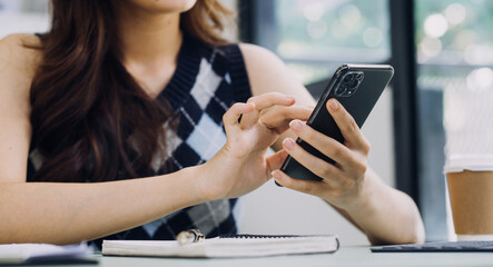 Businessman and team analyzing financial statement Finance task. with smart phone and laptop and tablet. Wealth management concept