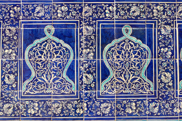 Most of the walls in the city citadel of Khiva were covered with blue floral tiles. Uzbekistan.