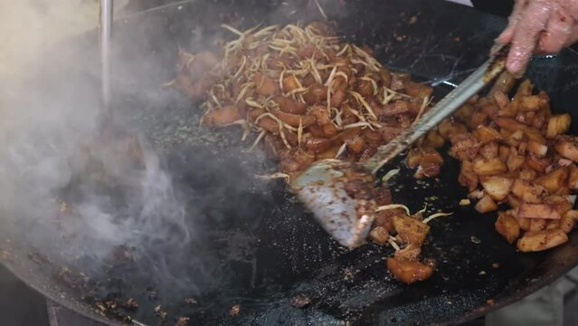 char kuey kak Fried Rice Cake street food preparation. Delicious Malaysia street food