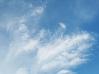 Spectacular cirrus clouds over Thailand, Blue Sky and Wispy Clouds that these clouds look really thin and wispy. It almost like someone painted a white-colored stroke on a blue canvas.