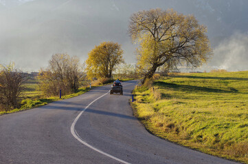 Slovak mountain road, foggy in late autumn.