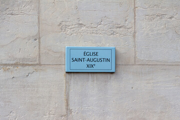 Eglise saint Augustin (Saint augustin church) street sign, one of the most famous churches in Paris, France.