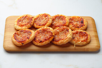 Banquet table with variety of stuffed pies pastry