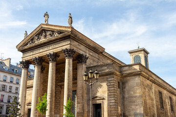 Fototapeta na wymiar Church Notre-Dame de Lorette on sunny day, Paris, France (the latin wrinting means 