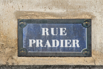 Rue Pradier street sign, one of the most famous streets in Paris, France.