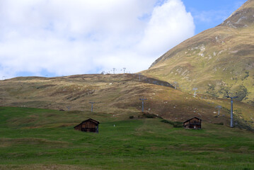Obraz premium Beautiful scenic landscape at Alp Milez, Canton Graubünden, in the Swiss alps at region Oberalppass on a blue cloudy late summer day. Photo taken September 5th, 2022, Milez Dieni, Switzerland.
