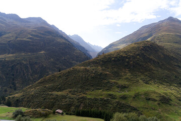 Mountain panorama at Swiss mountain pass Oberalppass on a sunny late summer morning. Photo taken...
