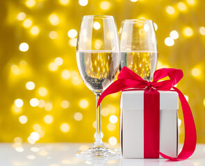 Champagne glasses and gift