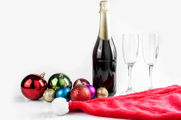 The champagne bottle and champagne glass with Christmas decorations