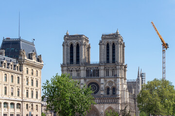 Panoramic view of the Cathedral Notre Dame de Paris in repair, on a sunny day, Paris, France.