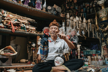 Dalang Wayang (Puppet Master) Wayang is a traditional form of puppet theatre play originating from...