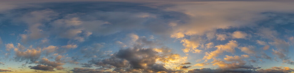 Dark blue sunset sky panorama with golden Cumulus clouds. Seamless hdr 360 panorama in spherical...