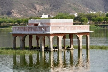 Jal Mahal and mountain in background at Jaipur, India.