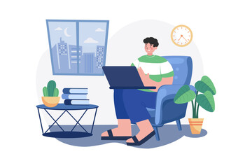 Man Working On His Laptop On The Sofa At Home