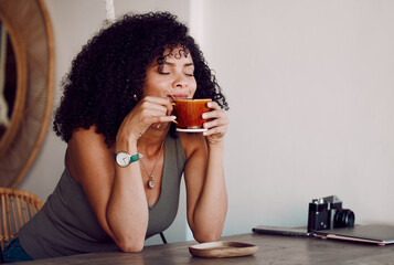 Black woman, smelling or coffee cup in restaurant, cafe or coffee shop for organic chai, matcha or...