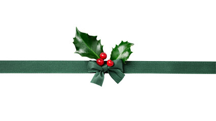 Green ribbon and  tied bow with holly berries for Christmas gift package decoration. Tied bow as an...