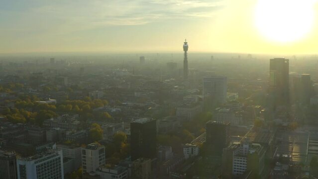 Slider Aerial shot of Euston station and BT Tower London at sunset