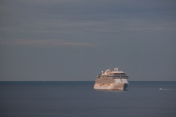 Regent luxury cruiseship or cruise ship liner Splendor arrival into Marseille Provence port during sunrise twilight blue hour Mediterranean cruise dream vacation