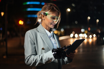 business woman with cyborg bionic arm and augmented reality visor.
