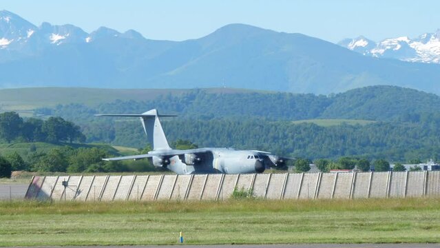 Airbus A400M Atlas Of The Belgian Air Component At Tarbes&ndash;Lourdes&ndash;Pyr&eacute;n&eacute;es Airport In Lourdes, France. Mountain Range In Background. wide