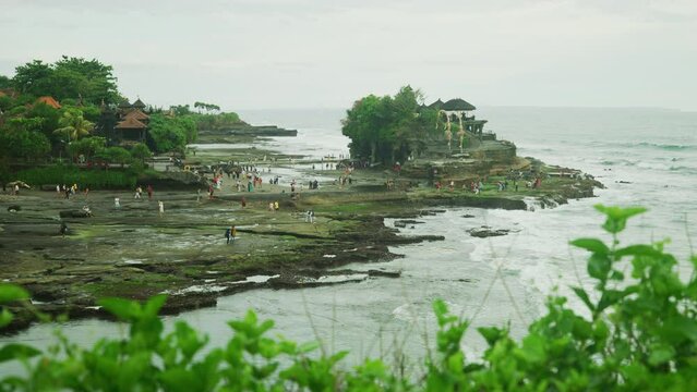 People visiting Tanah Lot, Bali, Indonesia