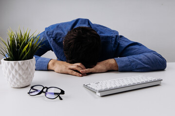 Stressed businessman in the office. Burnout concept