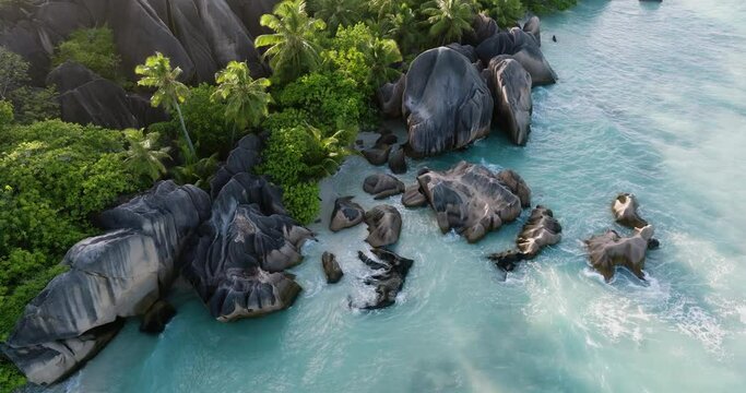 Circular aerial view of the granite boulders at the spectacular Anse Source d'Argent beach, La Digue,Seychelles