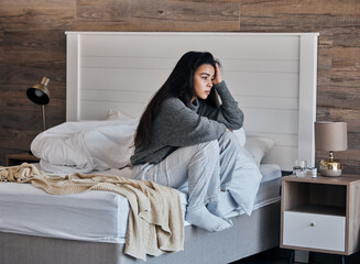 Insomnia, depression and woman in bedroom wake up or thinking of mental health problem, anxiety and morning fatigue. Depressed, stress and tired girl on her bed with psychology risk, sad or trauma - obrazy, fototapety, plakaty