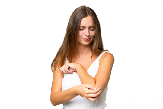 Young pretty woman over isolated background with pain in elbow