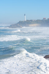 Looking across the waves to the Phare de Biarritz - Biarritz, France - obrazy, fototapety, plakaty