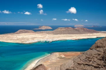Foto op Canvas Aerial shot of cliffs in north of Lanzarote with view of La Graciosa, Canary Islands © Jacqueline