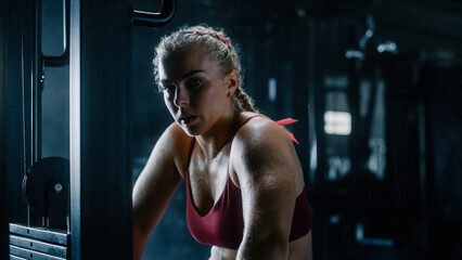 A Sweating Determined Female Weightlifter, That Just Finished her Training and Exercises,  Looking...