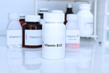 Vitamin B10 pills in a bottle, food supplement for health