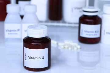 vitamin U pills in a bottle, food supplement for health