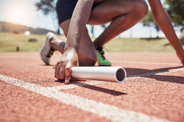 Stadium, running sports and relay athlete on start track ready for race. Fitness, athletics and...